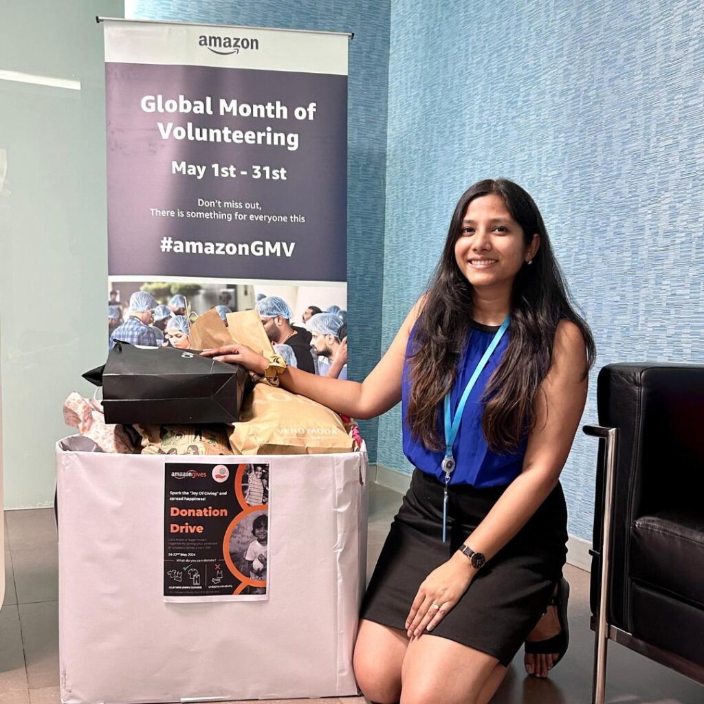 Amazon employee celebrating Global Volunteering Month by donating preloved clothes, shoes, etc. through Share At Door Step.