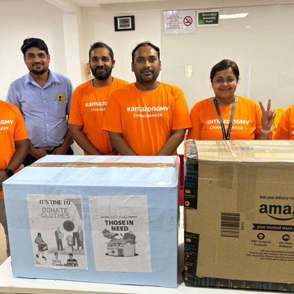 Amazon employees celebrating a nationwide collection drive with Share At Door Step during Global Volunteering Month across 40+ cities.